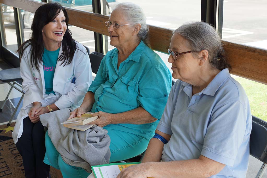 See, Test & Treat - Dr. Emory With Two Patients